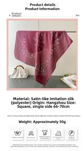 Detail view of burgundy paisley satin square scarf with material and washing specifications