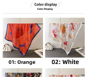 Color display showing chain print silk scarves in orange and white with sunburst motifs