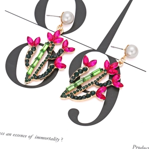 Exaggerated cactus drop earrings with colorful crystals and pearl stud accents
