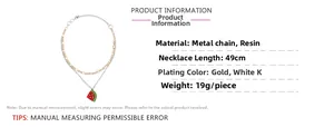 Detail view of 49cm watermelon pendant necklace with gold and silver metal chain