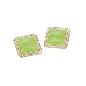 Detailed view of square candy-colored stud earrings with crystal halo and gold base