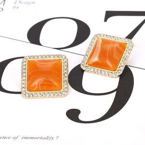 Orange geometric square earrings with marble texture resin and rhinestone halo in gold