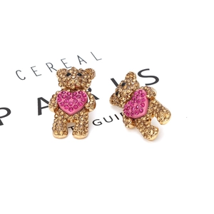Boucles d'oreilles ours dorées avec cristaux jaunes et pendentif cœur rose