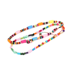 Collier bohème double couche en perles de bois colorées et pierres ethniques variées