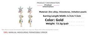 Détail des boucles d'oreilles étoile de mer dorées avec strass, perles et dimensions