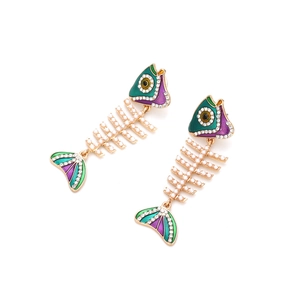 Exaggerated golden fishbone earrings with green enamel and white pearl accents