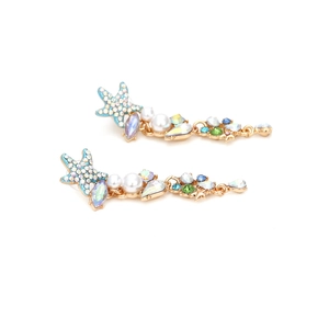 Long ocean-themed starfish earrings with colorful crystals and pearls on white background