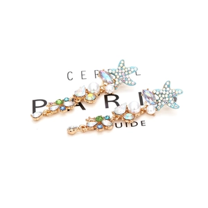 Elegant starfish drop earrings with colorful crystals and pearls on gold base