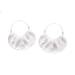 Silver geometric fan-shaped earrings with textured brushed finish on white background