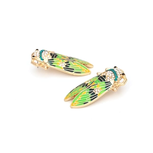 Vintage cicada earrings with yellow-green enamel wings and sparkling crystals on gold alloy
