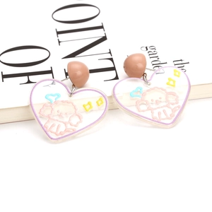 Cute heart-shaped acrylic earrings featuring cartoon dog embroidery patterns and pastel accents