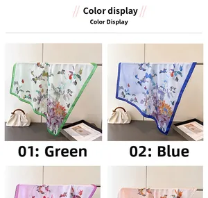Detail display of four silk scarves with vibrant butterfly prints and colorful edges