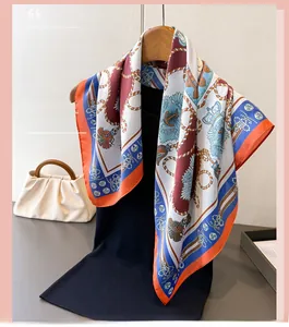 Detail of satin silk scarf with nautical rope and anchor print on a hanger