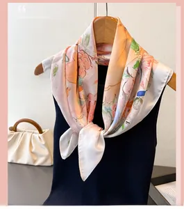 Detail of silk-like scarf featuring oil painting floral print tied on a black top
