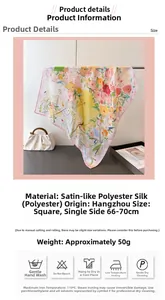 Detailed view of floral satin silk scarf with pink border and abstract oil painting print