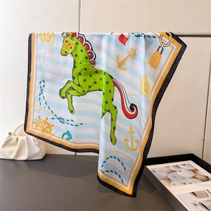 Detail of silk square scarf featuring nautical horse print with anchors and ropes