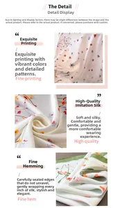 Close-up of floral print faux silk scarf with high-quality edge stitching details