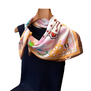 Elegant nautical print silk square scarf with rudder and floral patterns on black top