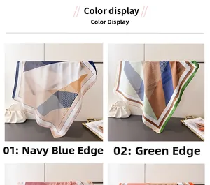 Detail view of geometric stripe silk scarf in navy and green contrast patterns