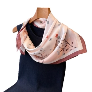 Floral print faux silk square scarf with pink and cream floral branch pattern and red edges