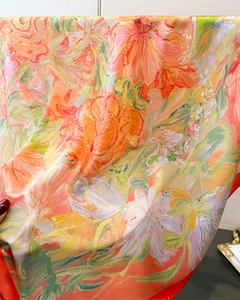 Detail showing vintage oil painting floral print on shiny silk satin square scarf