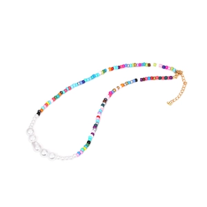 Bohemian colorful handmade beaded necklace with white pearls and adjustable gold clasp