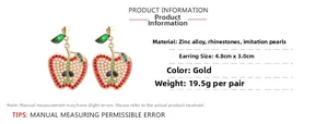 Detail showing dimensions of apple earrings with colorful rhinestones and faux pearls