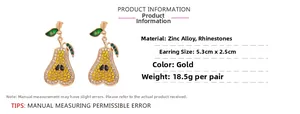 Vue détaillée de boucles d'oreilles poire avec strass jaunes et dimensions du produit