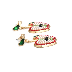 Exaggerated retro apple earrings with red crystals and pearls on white background