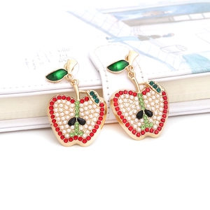Chic apple-shaped earrings with red rhinestones, white pearls, and green enamel leaves
