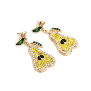 Boucles d'oreilles poire étincelantes avec strass jaunes et détails de feuilles vertes