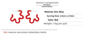 Macro detail of red wavy zinc alloy earrings with specific weight and size parameters