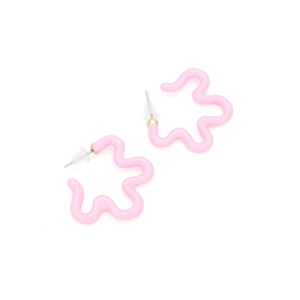 Detail of pink wavy resin hoop earrings with gold metal posts and clear backs