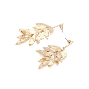 Detail of gold leaf drop earrings featuring textured metal veins and layered leaf design