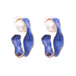 Exaggerated C-shaped gold alloy earrings with blue marble enamel and pearl accents