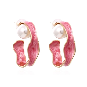 Pink enamel C-shaped hoop earrings with gold-plated metal base and white pearls