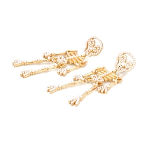 Exaggerated vintage gold skeleton earrings inlaid with white pearls for women