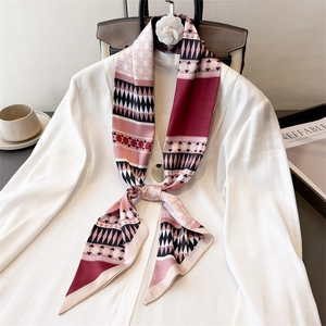 Elegant geometric print silk scarf with burgundy and pink tones for office wear