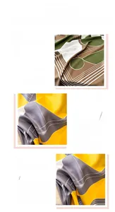 Detailed view of geometric twill silk scarf showing fabric texture and fine hemmed edges