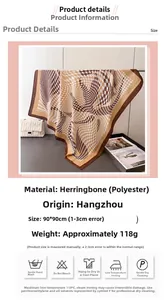 Detail view of 90x90cm houndstooth silk scarf with washing care guide and dimensions