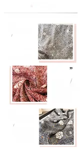 Détail d'un foulard en soie montrant la texture à chevrons et l'imprimé floral