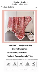Detailed view of red paisley silk-like polyester scarf with 90x90cm size and washing icons