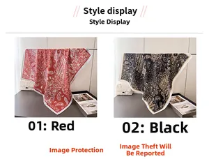 Detailed display of red and black square silk scarves with classic paisley print pattern