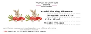 Detailed view of carrot rabbit racing earrings made of zinc alloy and colorful rhinestones