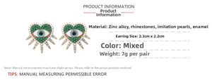 Macro shot of evil eye heart stud earrings with beads and dimensions 2.3cm x 2.2cm