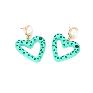 Detail of mint green heart earrings with green rhinestones and white pearl studs