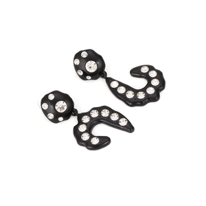 Asymmetric geometric earrings with black lacquer and sparkling crystals in a modern design
