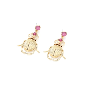 Golden beetle earrings with pink gemstones in a vintage bohemian insect style design