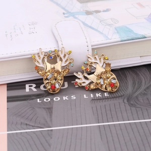 Christmas reindeer stud earrings with colorful rhinestones and white enamel finish