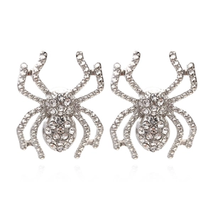 Gothic silver spider stud earrings with sparkling crystals and symmetrical insect design